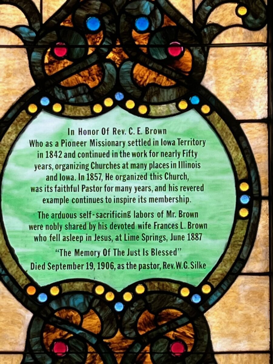 insert of stain glass window William C. Brown donated to church in honor of his parents in Lime Springs.