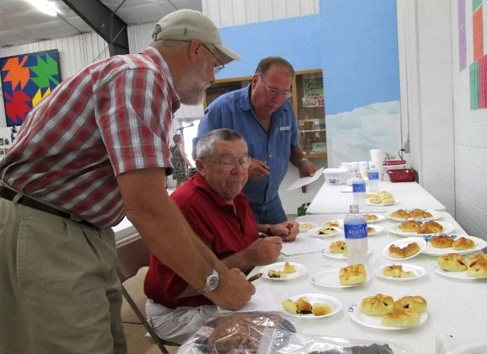 Judging Kolaches at the Fair inside the Featherlite Center