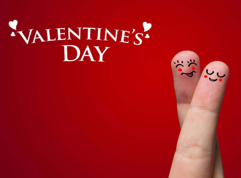 Valentine's Day with two fingers with drawn on faces