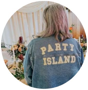 woman with coat with Party Island on back